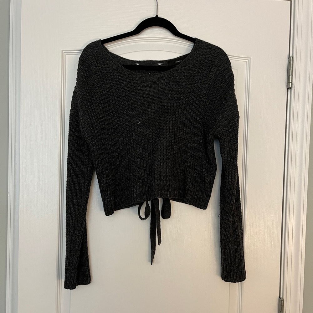 Charcoal grey sweater with tie down back